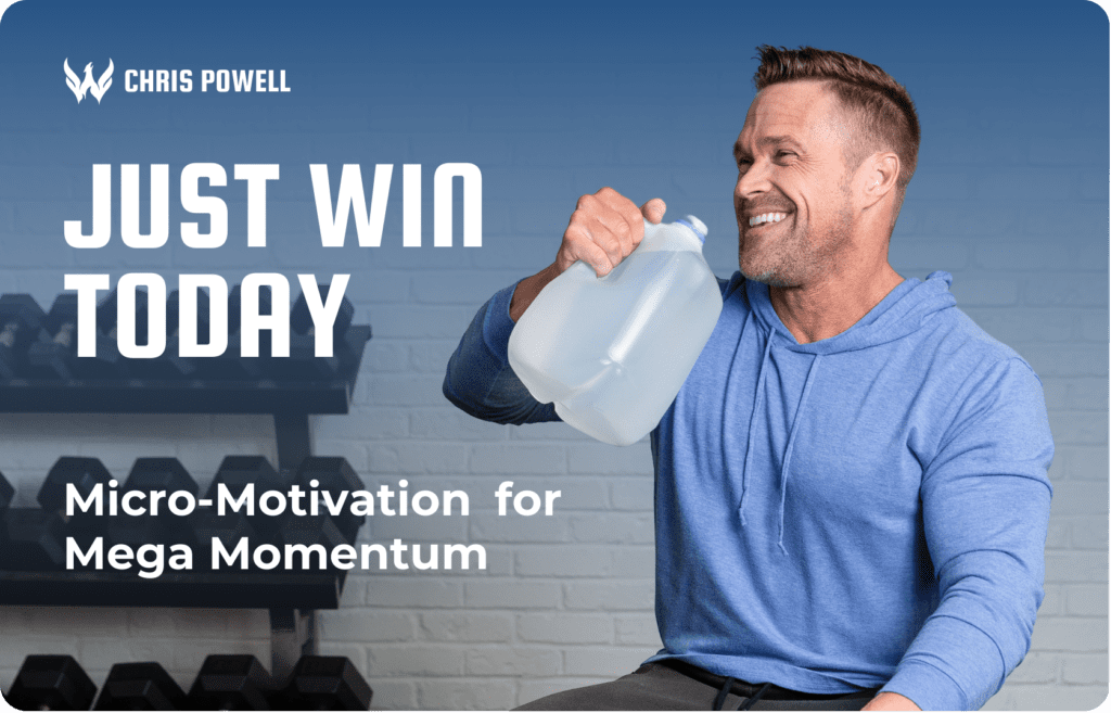 Fitness expert Chris Powell smiling while holding a gallon water jug with the motivational phrase “Just Win Today” and tagline “Micro-Motivation for Mega Momentum